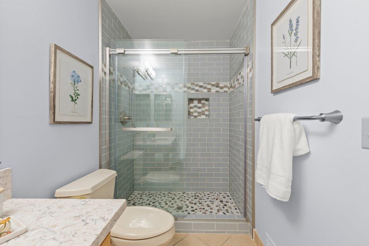 160 Troon Way Half Moon Bay, CA 94019 - Photo 22 of 28 a bathroom with a shower and toilet