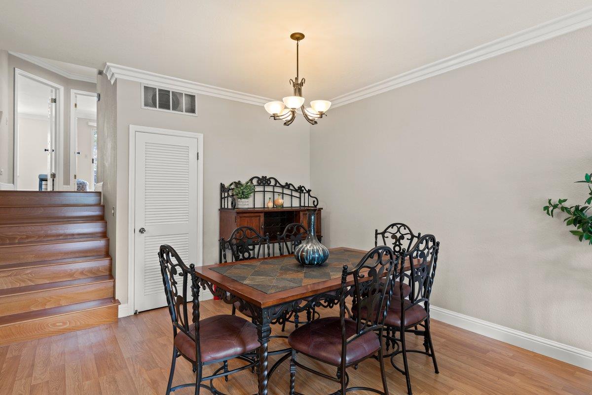 160 Troon Way Half Moon Bay, CA 94019 - Photo 5 of 28 a dining room with furniture and wooden floor