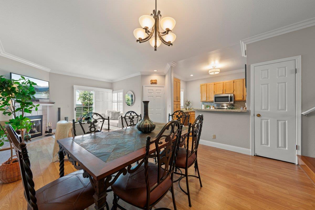160 Troon Way Half Moon Bay, CA 94019 - Photo 6 of 28 a view of a dining room with furniture and wooden floor