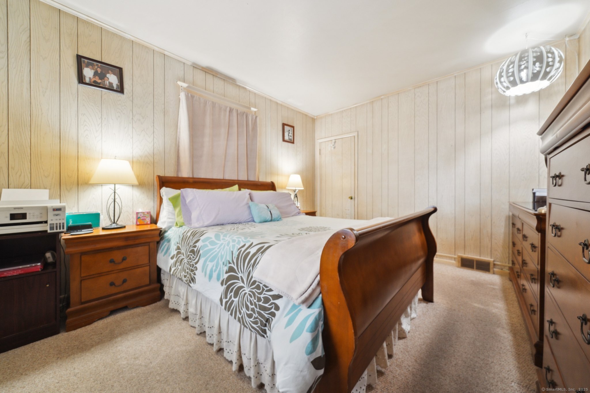 17 Alden Street Stamford, CT 06902 - Photo 11 of 34 a bedroom with bed and a night stand