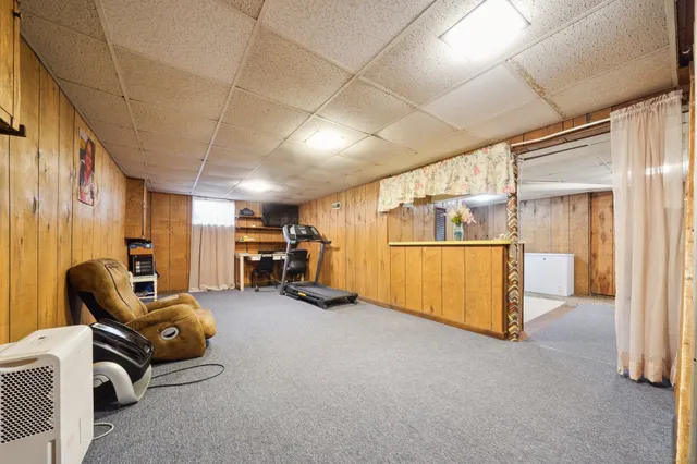 a view of a livingroom with furniture and a couch