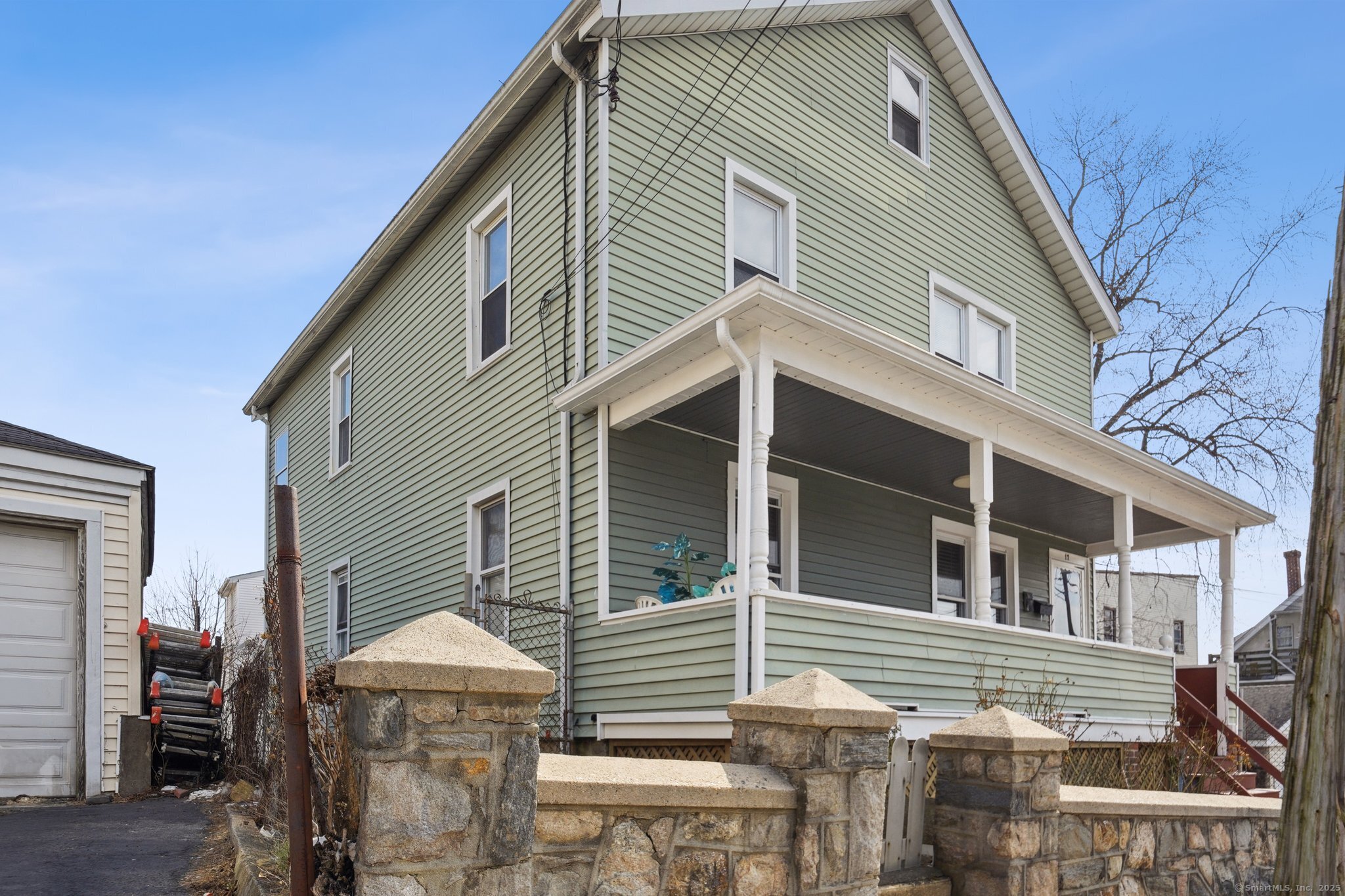 17 Alden Street Stamford, CT 06902 - Photo 26 of 34 a front view of a house with stairs