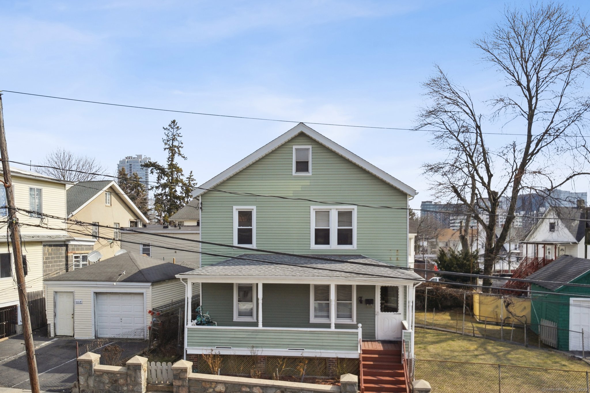 17 Alden Street Stamford, CT 06902 - Photo 29 of 34 a front view of a house with a yard