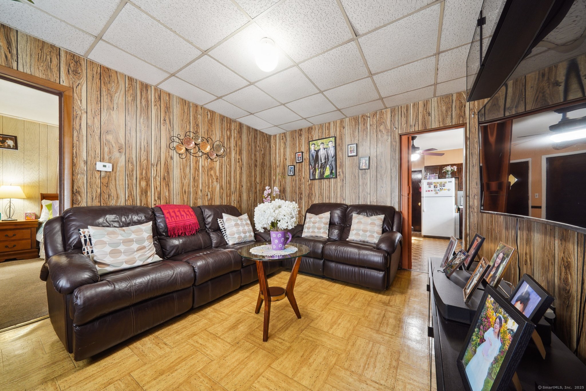 17 Alden Street Stamford, CT 06902 - Photo 7 of 34 a living room with furniture and a flat screen tv