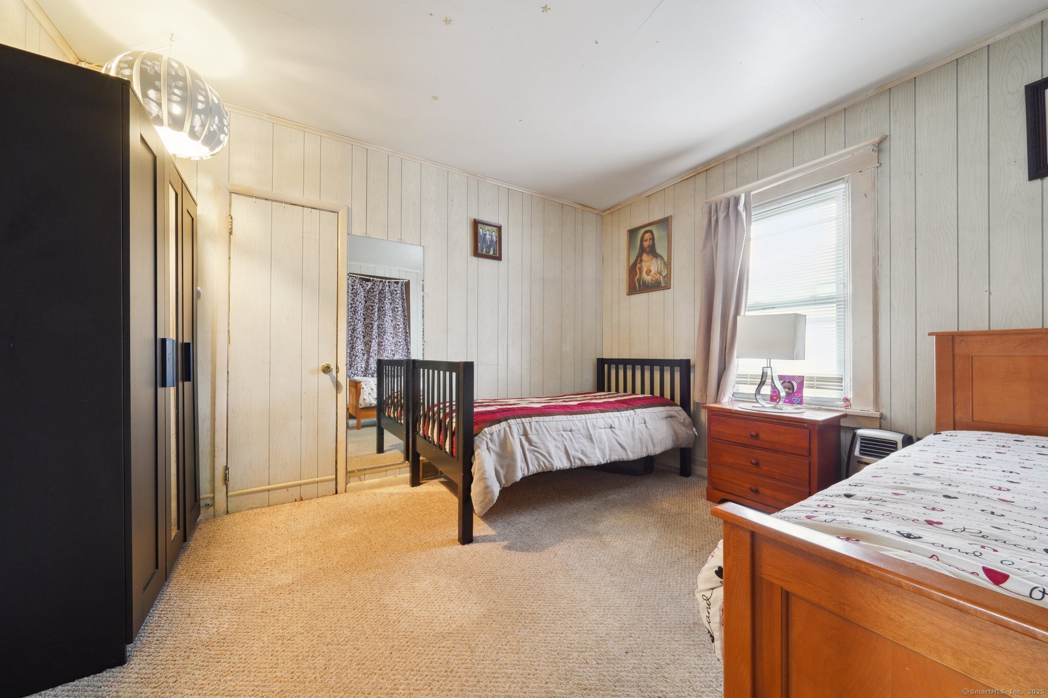 17 Alden Street Stamford, CT 06902 - Photo 10 of 34 a bedroom with bed and window