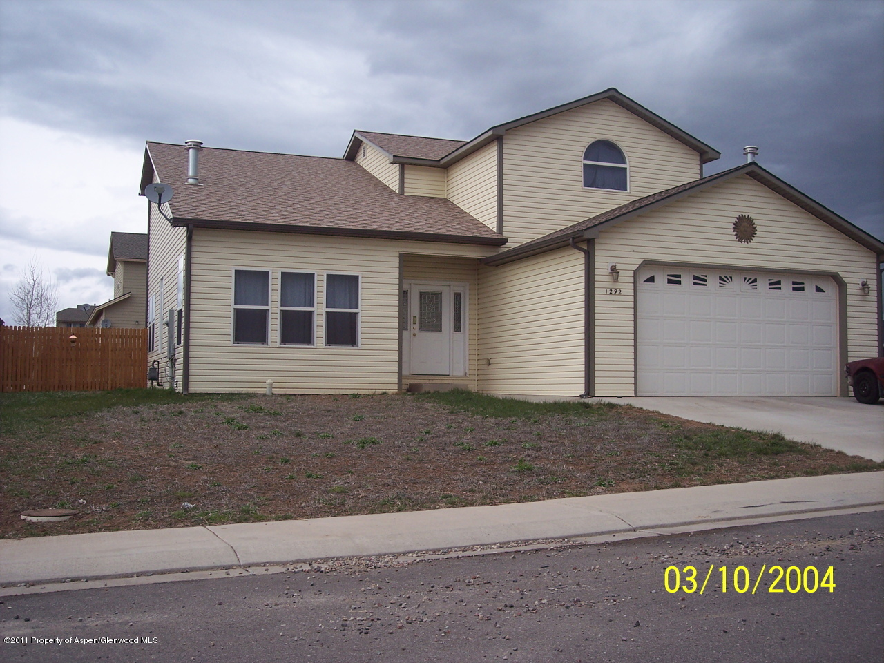1292 East 18th Way Rifle, CO 81650 - Photo 1 of 6 a view of a house with a yard