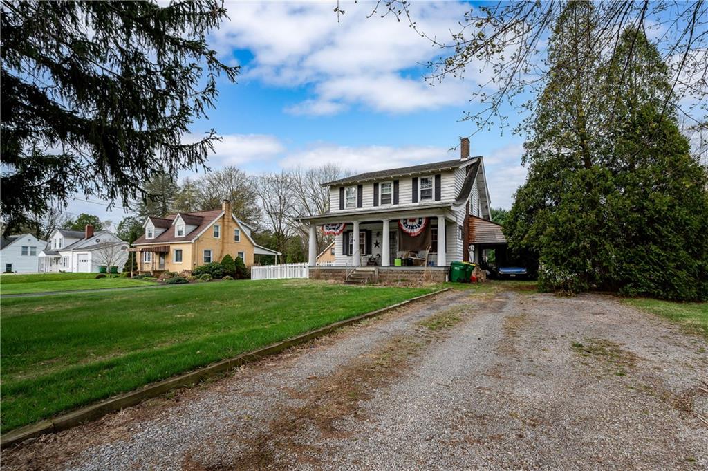 506 Meridian Road Renfrew, PA 16053 - Photo 2 of 10 a front view of a house with a yard
