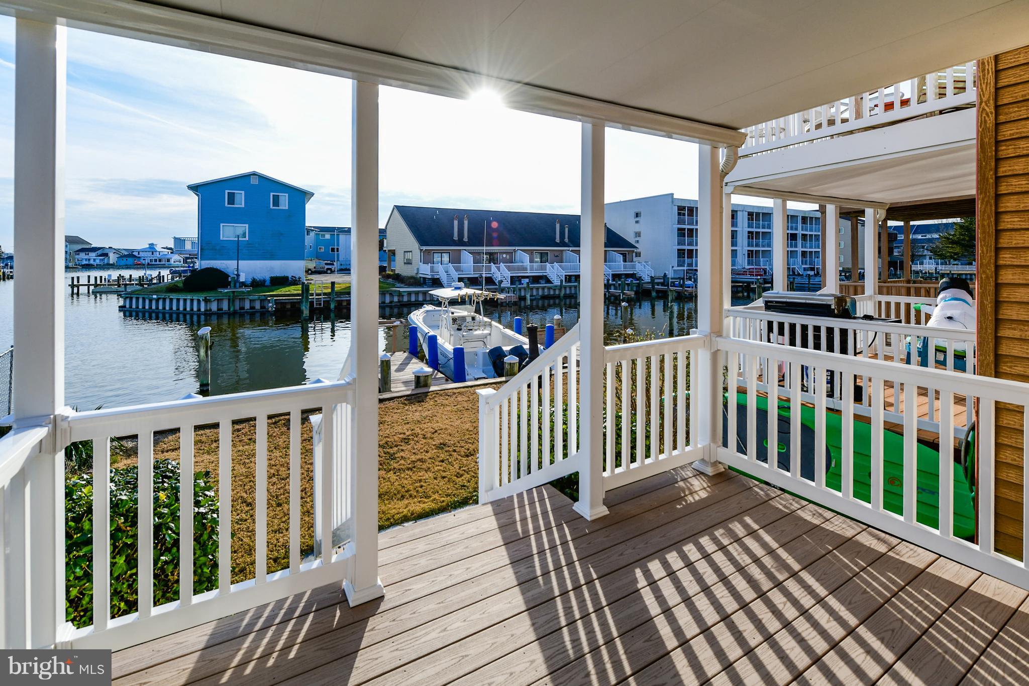 611 Salt Spray Road Ocean City, MD 21842 - Photo 3 of 32 Covered Main Level Deck - Brand New!