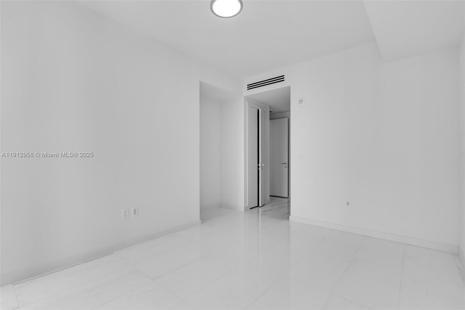 300 Biscayne Blvd Way, Unit 3009 Miami, FL 33131 - Photo 13 of 52 a view of an empty room