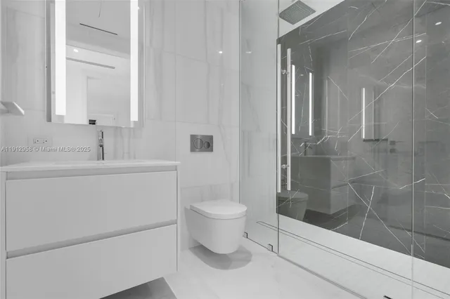 a view of a hallway with washer and dryer