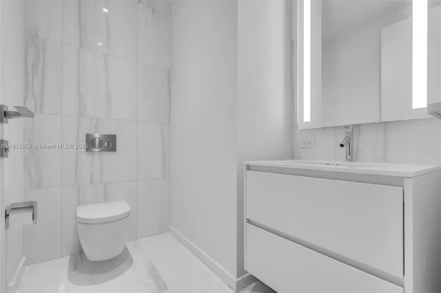 a view of a bathroom with shower