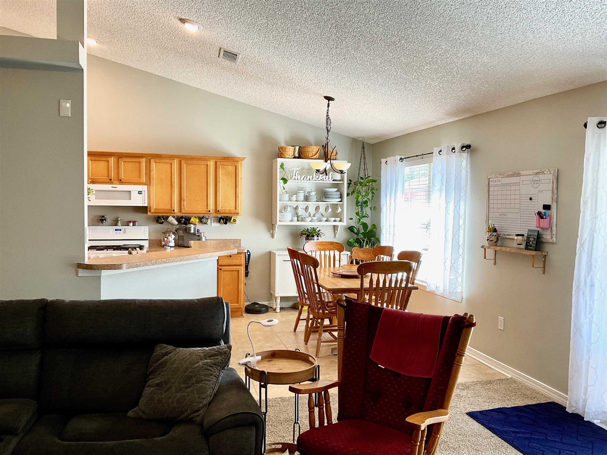 596 Batten Boulevard Pensacola, FL 32507 - Photo 13 of 48 a view of a dining room with furniture window and wooden floor