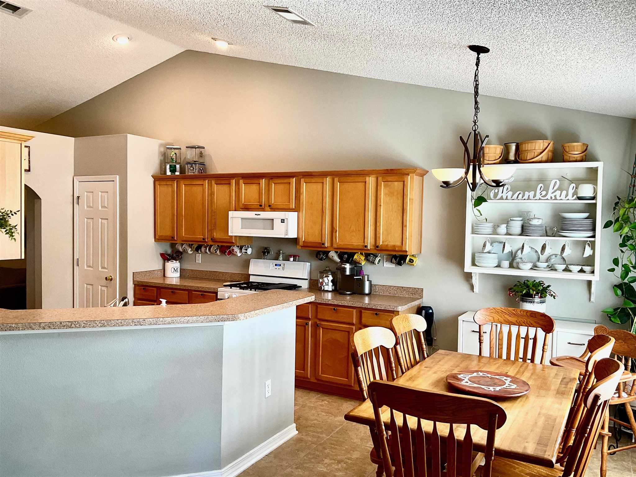 596 Batten Boulevard Pensacola, FL 32507 - Photo 15 of 48 a dining room with furniture and a floor to ceiling window