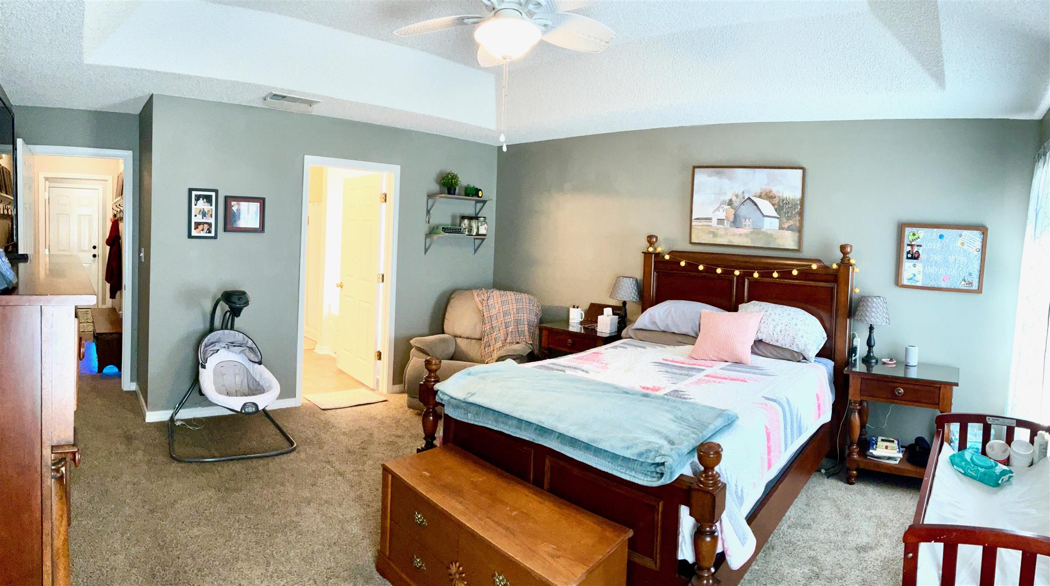 596 Batten Boulevard Pensacola, FL 32507 - Photo 18 of 48 a bedroom with a bed and wooden floor