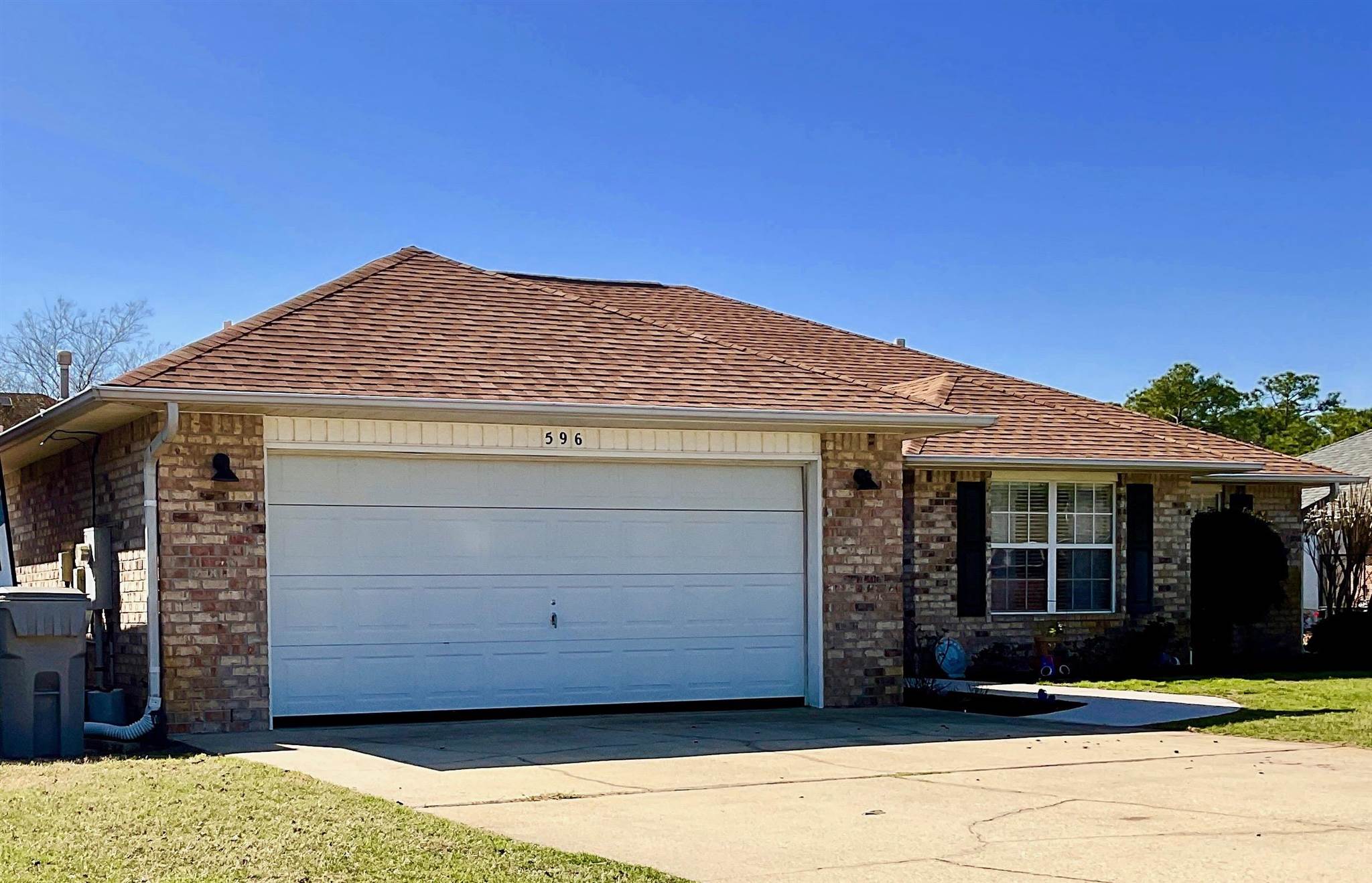 596 Batten Boulevard Pensacola, FL 32507 - Photo 2 of 48 a front view of a house