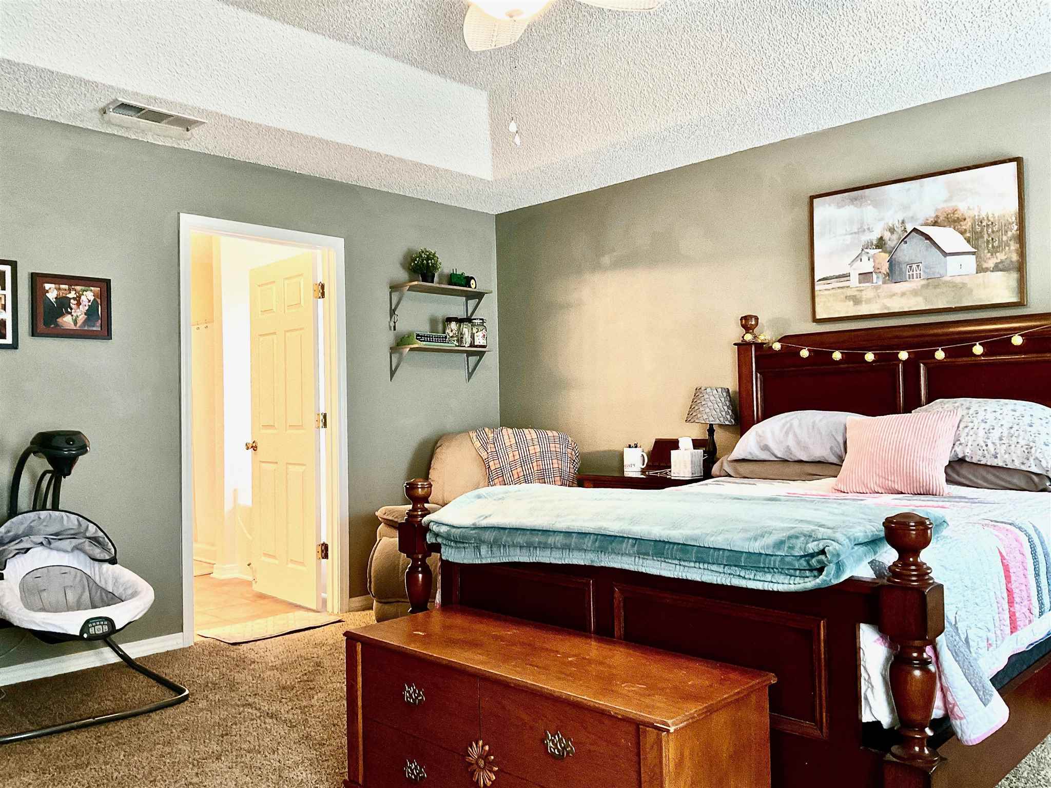 596 Batten Boulevard Pensacola, FL 32507 - Photo 21 of 48 a bedroom with a bed and wooden floor