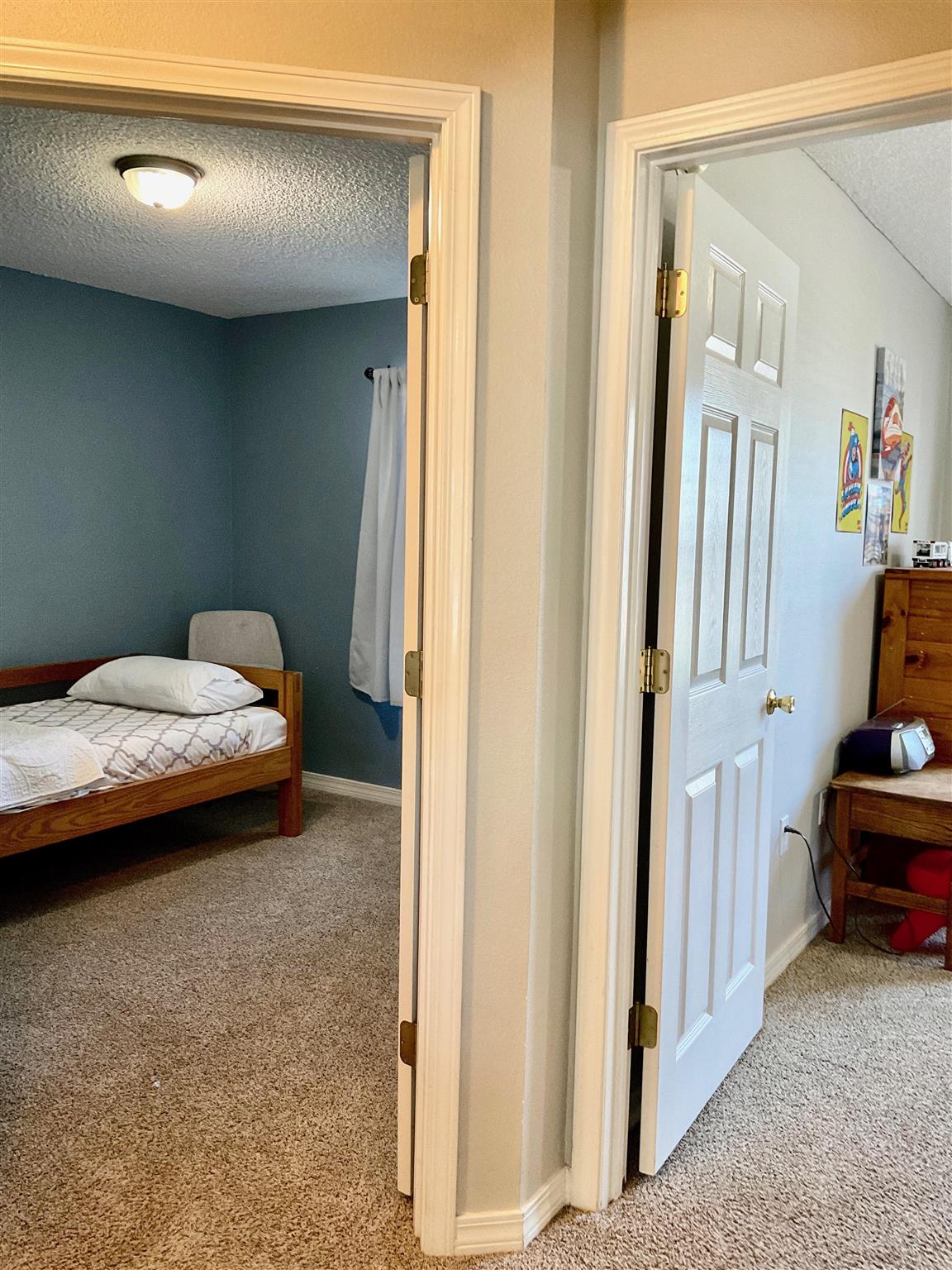 596 Batten Boulevard Pensacola, FL 32507 - Photo 27 of 48 a bedroom with a bed and a window