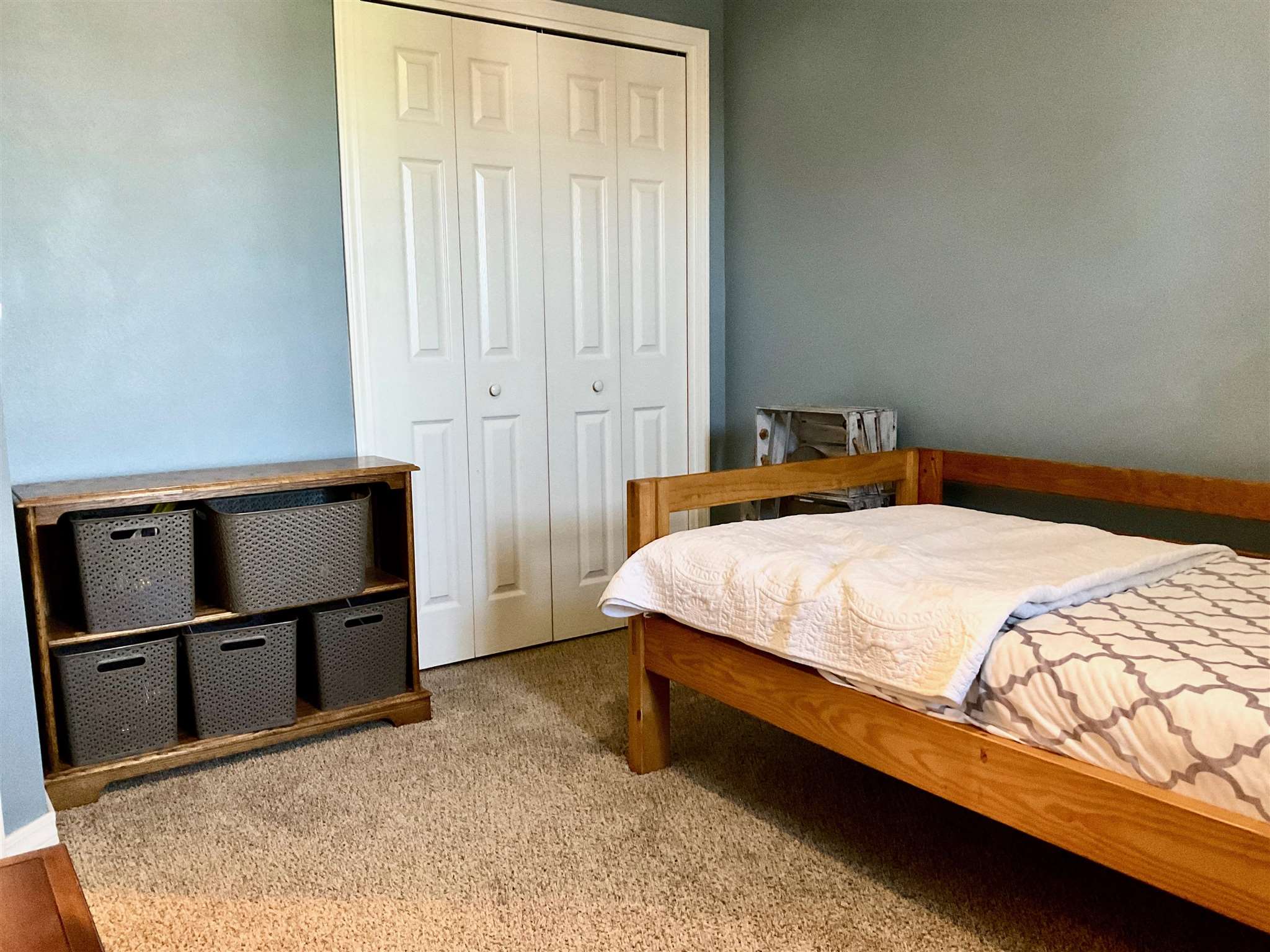 596 Batten Boulevard Pensacola, FL 32507 - Photo 30 of 48 a bed sitting in a bedroom next to a window