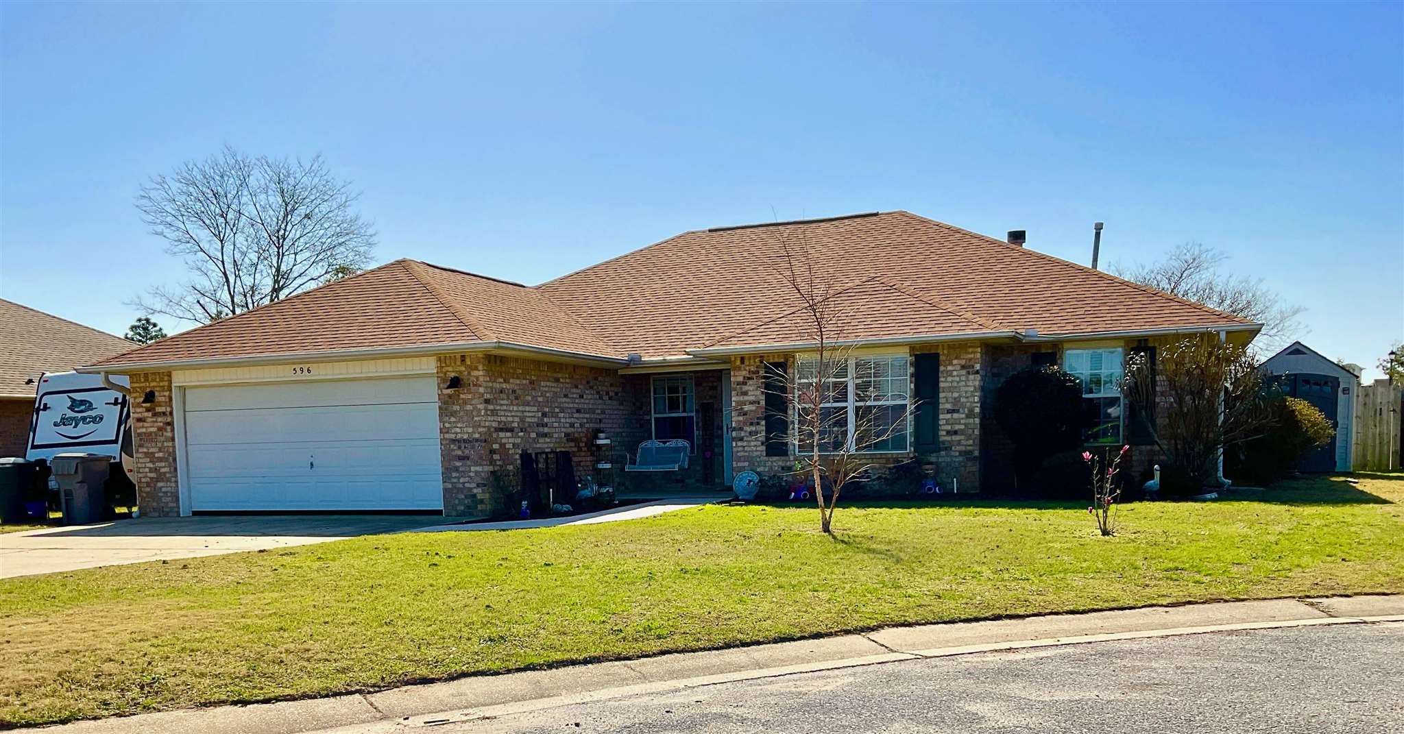 596 Batten Boulevard Pensacola, FL 32507 - Photo 3 of 48 a view of house with a yard