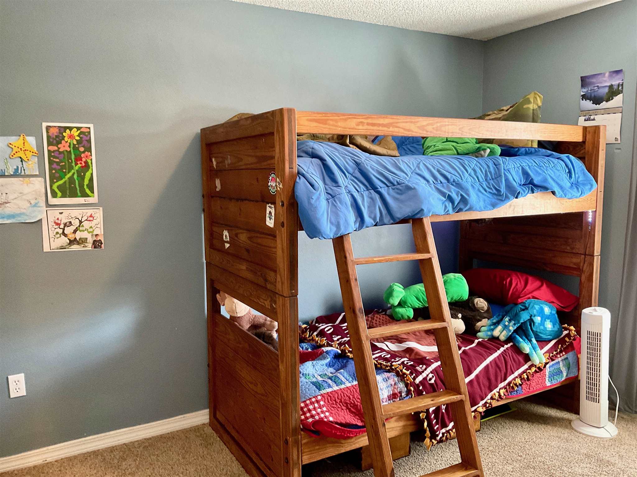 596 Batten Boulevard Pensacola, FL 32507 - Photo 36 of 48 a bedroom with a bed and a table