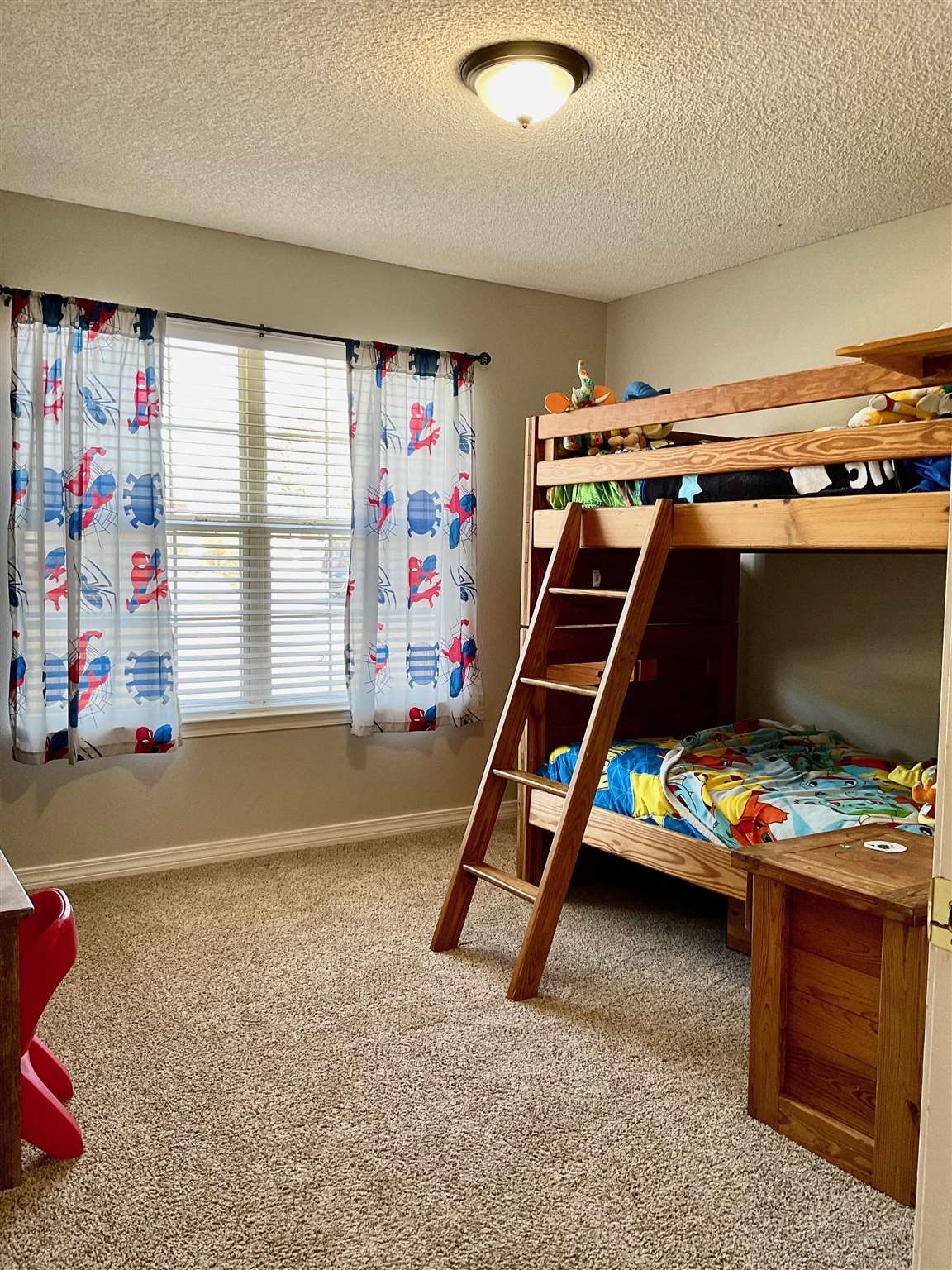 596 Batten Boulevard Pensacola, FL 32507 - Photo 39 of 48 a bedroom with furniture and a window