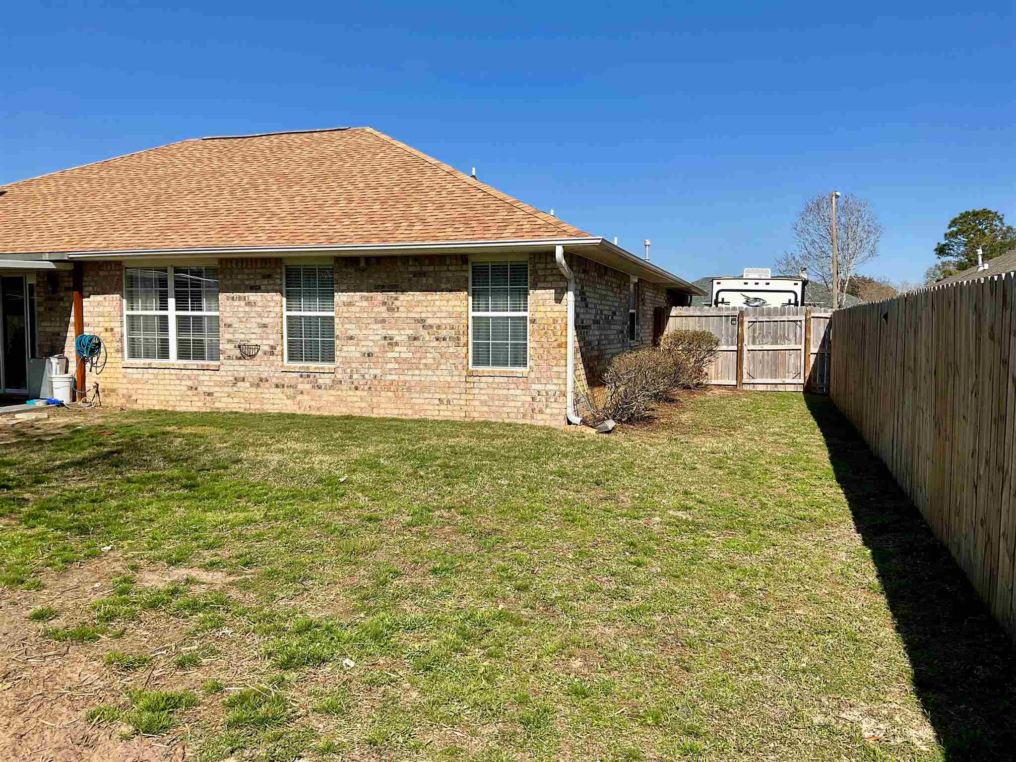 596 Batten Boulevard Pensacola, FL 32507 - Photo 43 of 48 a front view of a house with yard