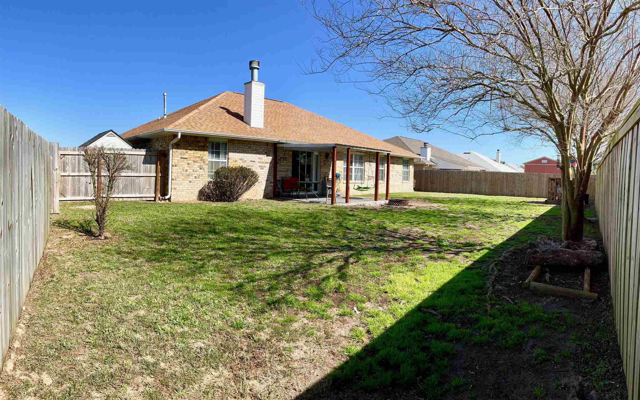 596 Batten Boulevard Pensacola, FL 32507 - Photo 48 of 48 a front view of a house with a yard