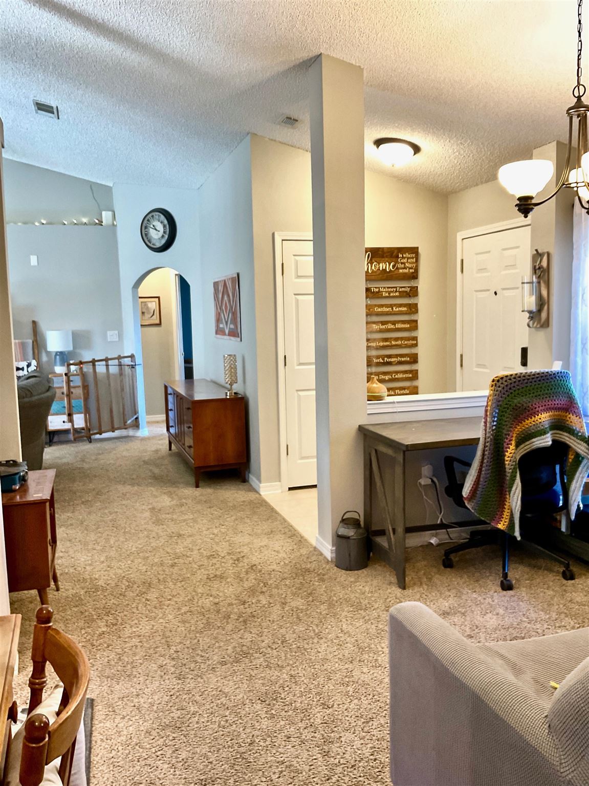 596 Batten Boulevard Pensacola, FL 32507 - Photo 8 of 48 a bedroom with a bed and furniture