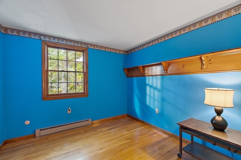 22 Sunset Rock Road Andover, MA 01810 - Photo 18 of 38 a bedroom with a bed and a window