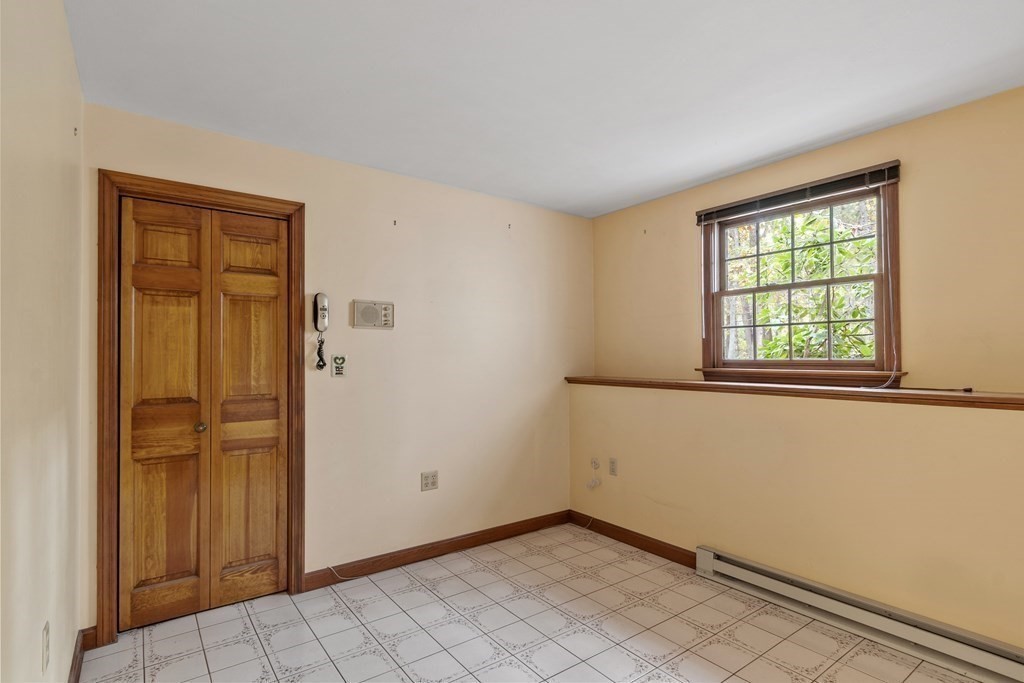 22 Sunset Rock Road Andover, MA 01810 - Photo 22 of 38 a view of an empty room with window