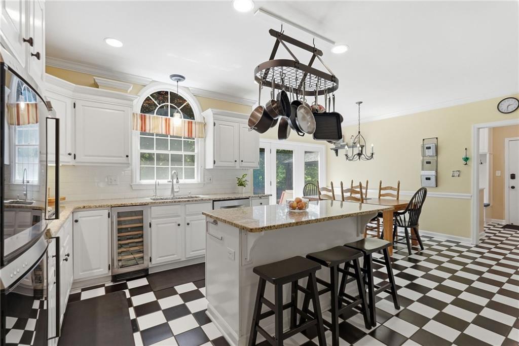 900 Settlers Ridge Road Pittsburgh, PA 15238 - Photo 13 of 50 From everyday meals to holiday gatherings, this well-designed kitchen offers ample workspace, a large center island, and convenient overhead pot storage.