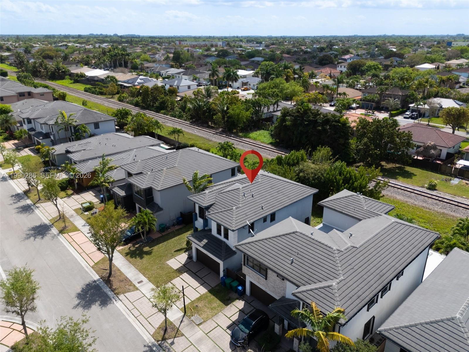 16058 Southwest 136 Way Miami, FL 33196 - Photo 20 of 21 an aerial view of a city view and lake view