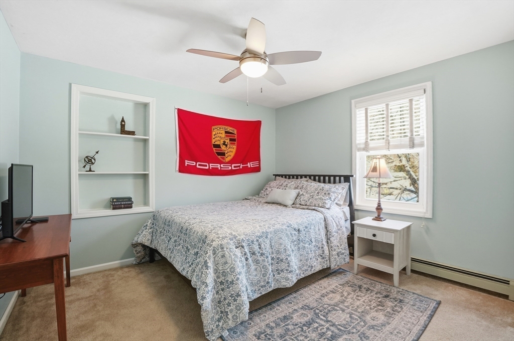 174 Columbus Drive Fall River, MA 02720 - Photo 30 of 33 a bedroom with a bed and a window