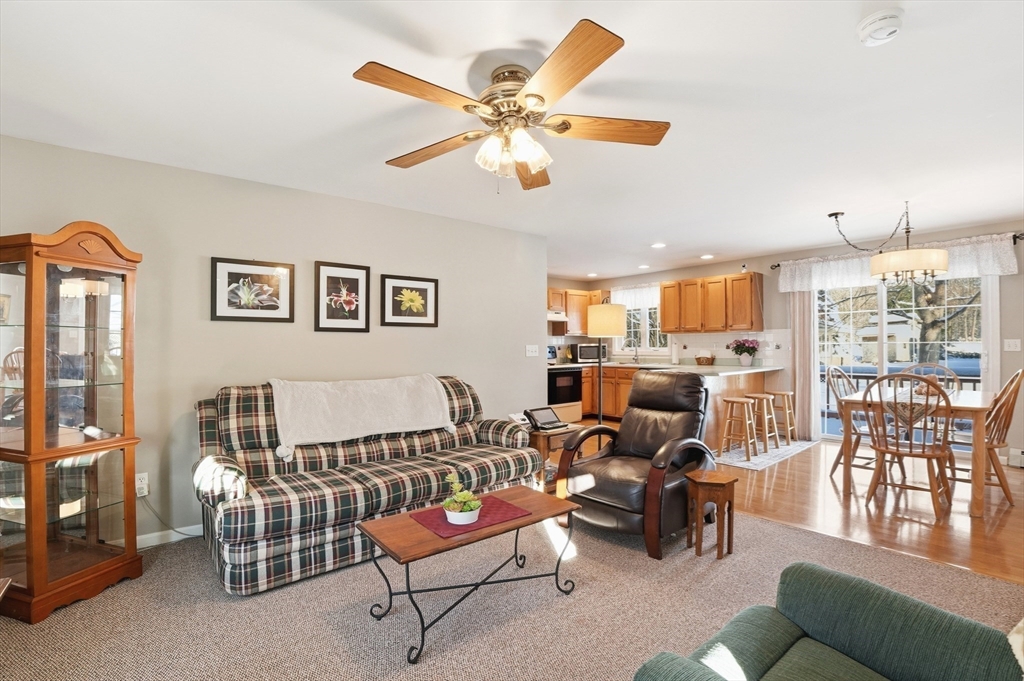 174 Columbus Drive Fall River, MA 02720 - Photo 4 of 33 a living room with furniture and kitchen view