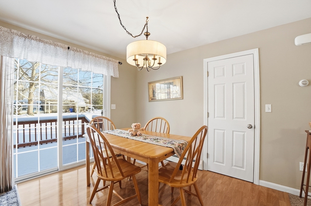 174 Columbus Drive Fall River, MA 02720 - Photo 7 of 33 a view of a dining room with furniture window and wooden floor