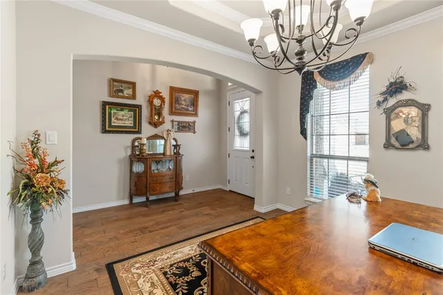 a view of a livingroom with furniture and window