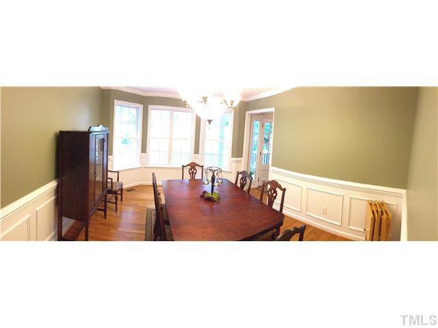 233 Mark Lane Raleigh, NC 27603 - Photo 9 of 14 Formal Dining room boasts hardwoods and plenty of trim for those perfect holiday dinners. Dining Room