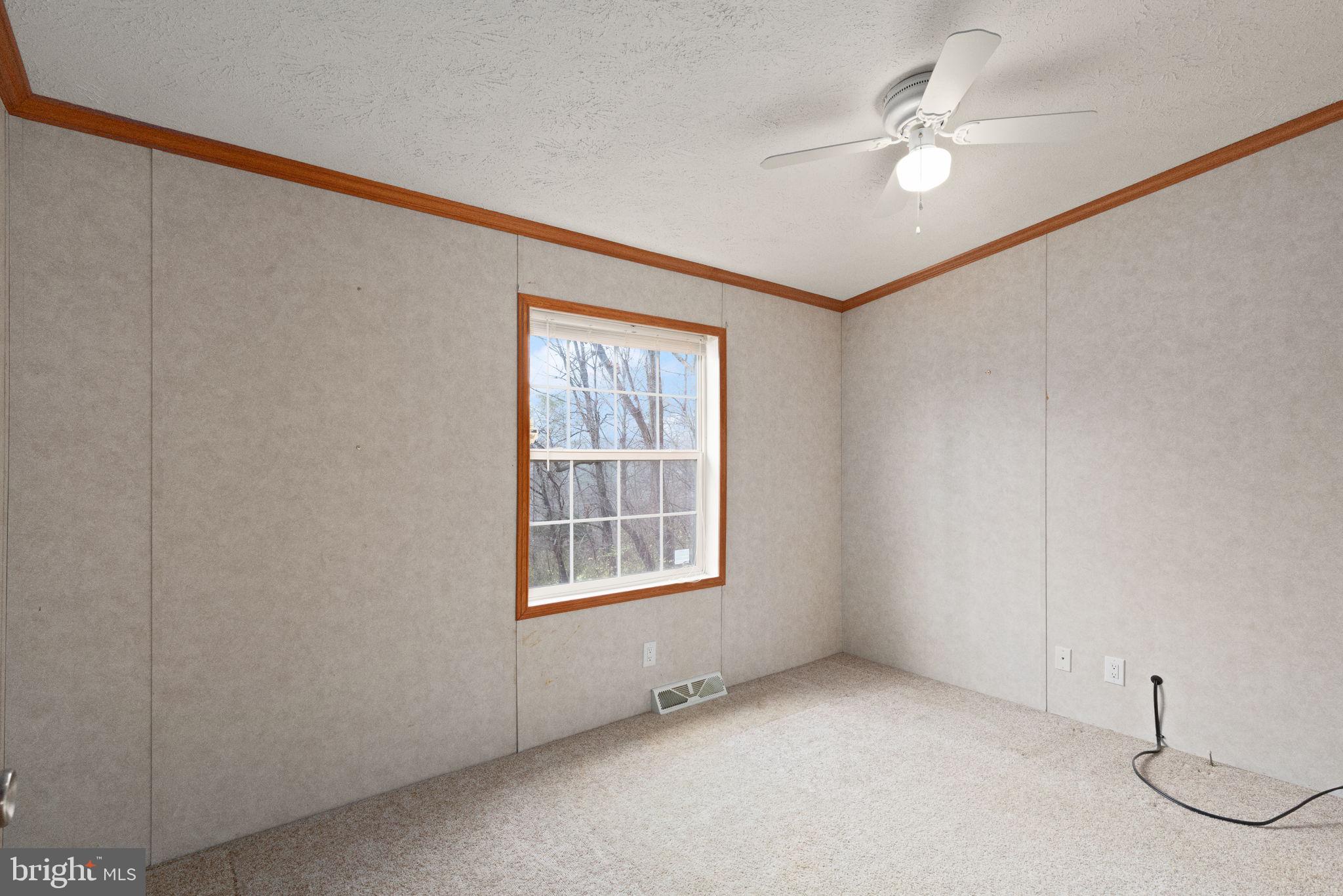 16 High Ridge Road Delta, PA 17314 - Photo 19 of 32 an empty room with windows and fan