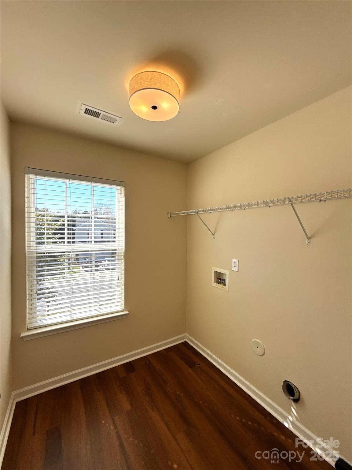 1484 Haverford Road Northwest Concord, NC 28027 - Photo 25 of 33 an empty room with wooden floor and windows