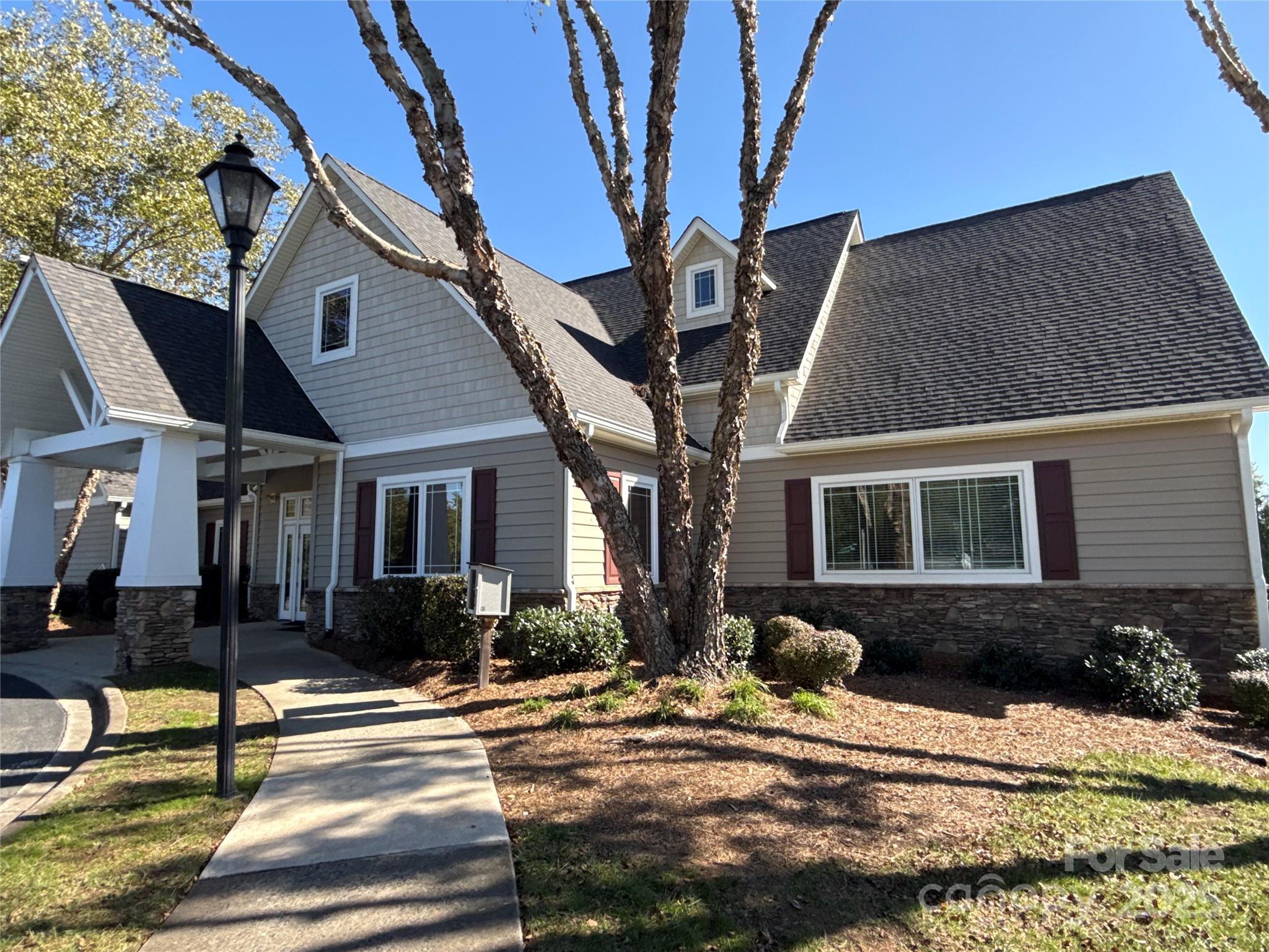 1484 Haverford Road Northwest Concord, NC 28027 - Photo 29 of 33 a view of a house with street next to a road
