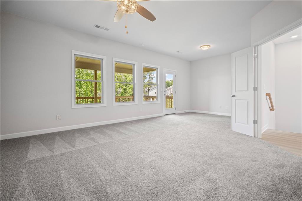 203 Retreat Lane Canton, GA 30114 - Photo 16 of 47 a view of an empty room with a window