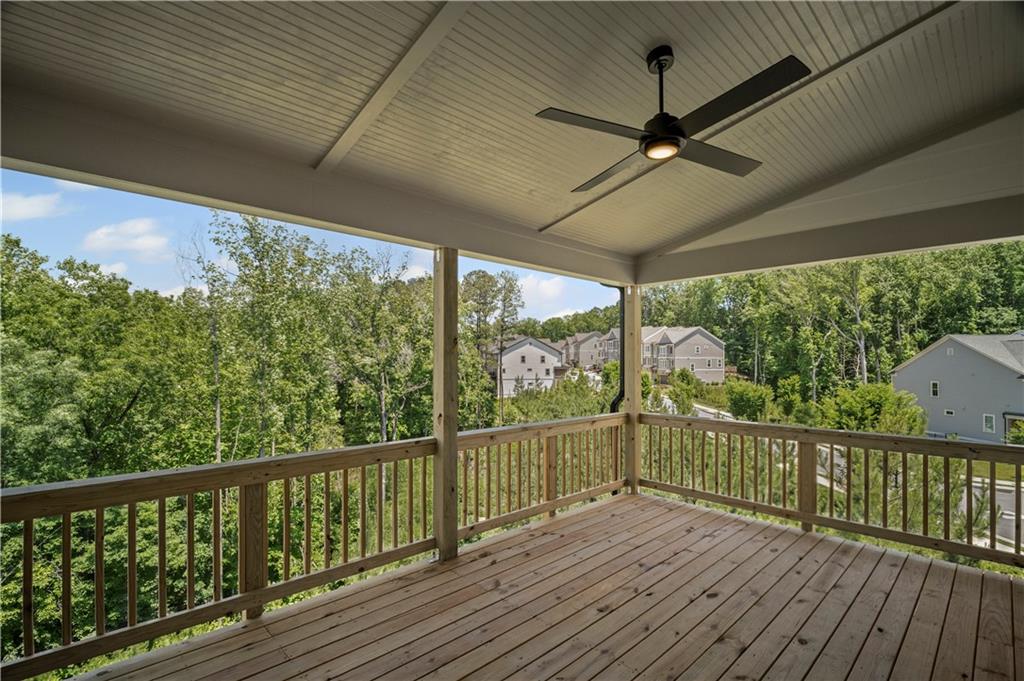 203 Retreat Lane Canton, GA 30114 - Photo 19 of 47 a view of a balcony with wooden floor