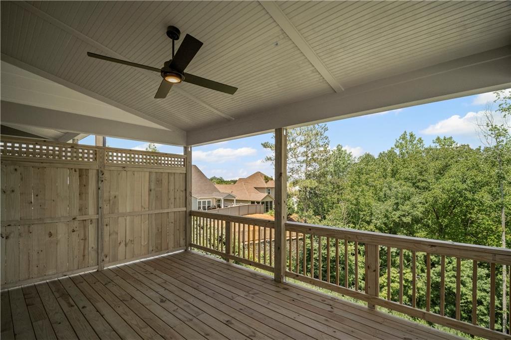 203 Retreat Lane Canton, GA 30114 - Photo 20 of 47 a view of a balcony with wooden floor