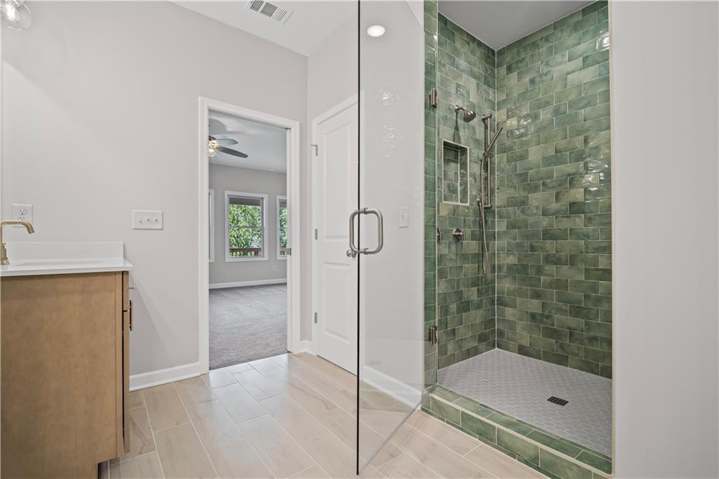203 Retreat Lane Canton, GA 30114 - Photo 23 of 47 a bathroom with a shower
