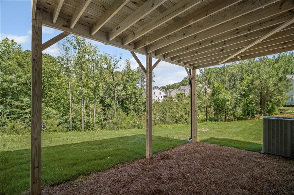 203 Retreat Lane Canton, GA 30114 - Photo 29 of 47 a view of a porch with a backyard