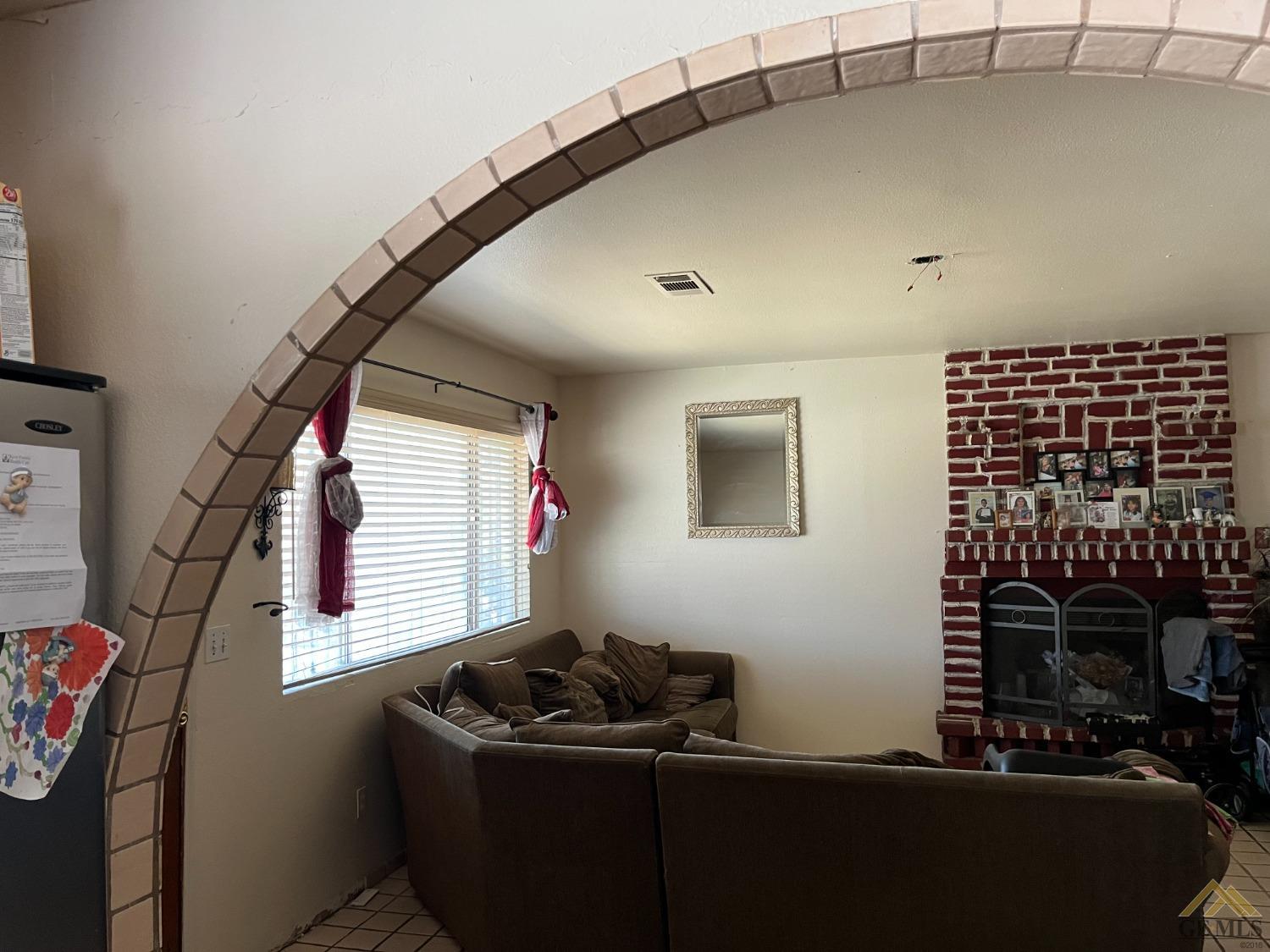 Undisclosed Address Delano, CA 93215 - Photo 8 of 9 a room with window and furniture