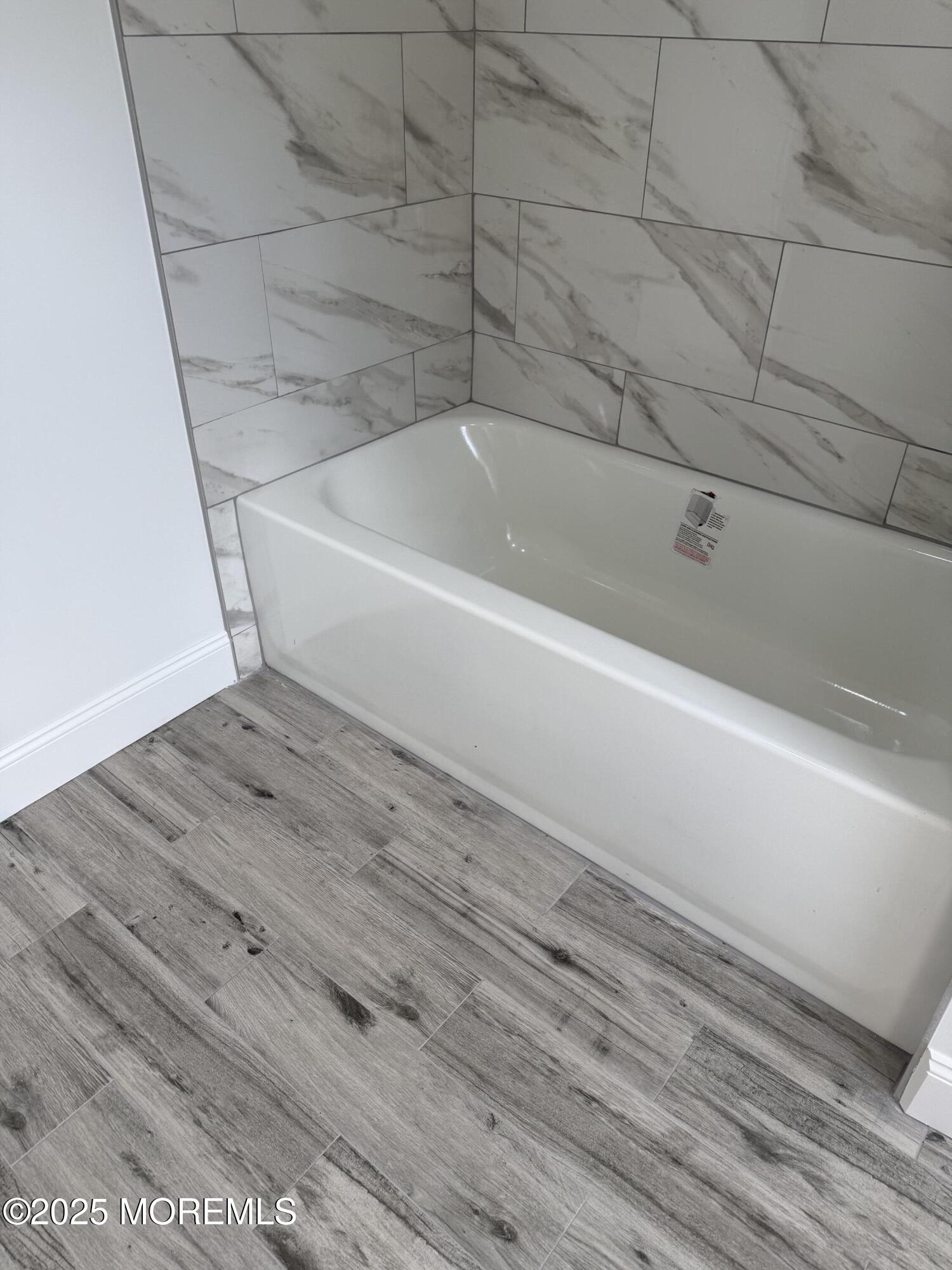 140 Franklin Avenue, Unit 3 Long Branch, NJ 07740 - Photo 11 of 14 a bathroom with a bathtub