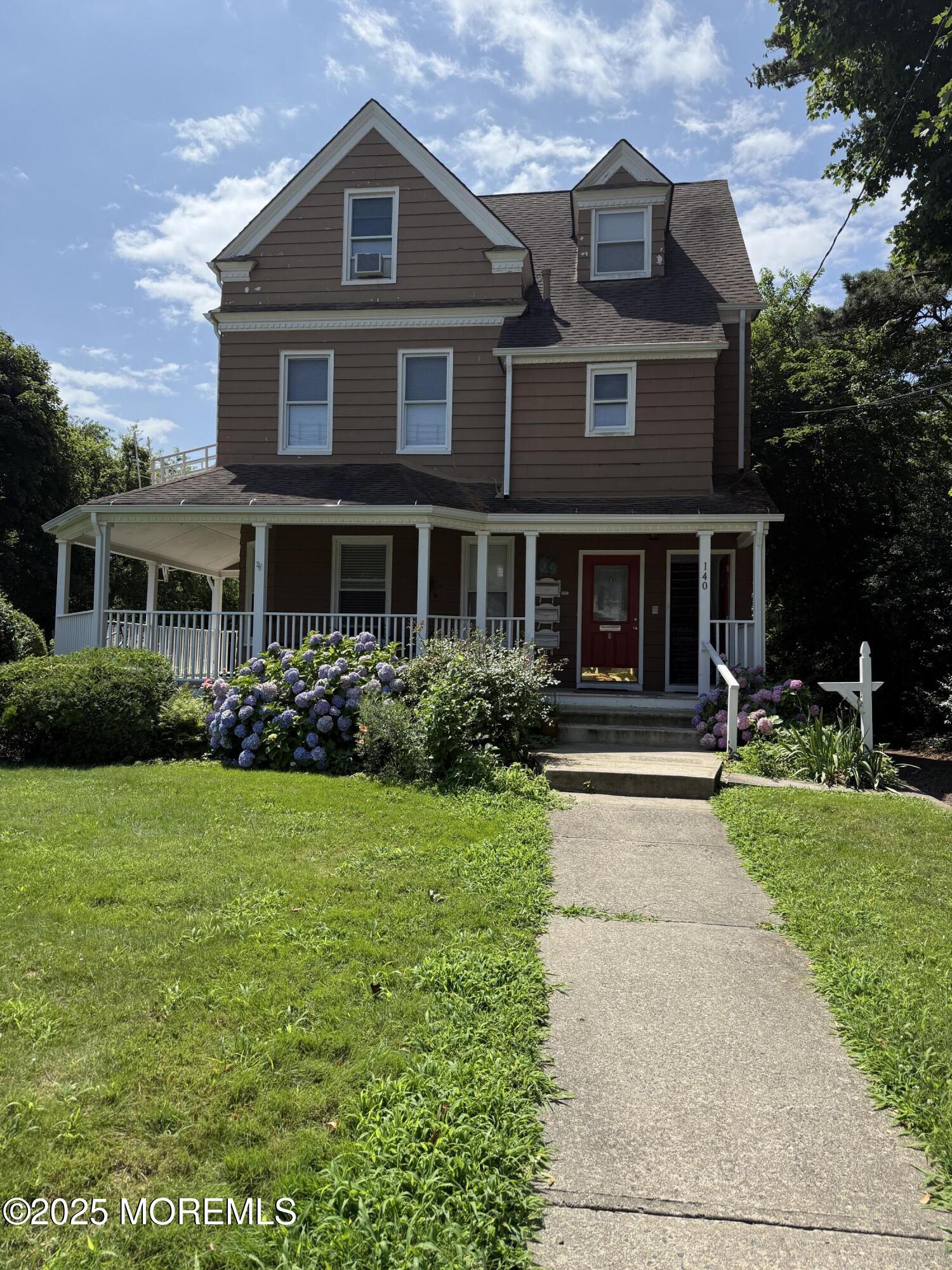 140 Franklin Avenue, Unit 3 Long Branch, NJ 07740 - Photo 14 of 14 a front view of a house with a yard