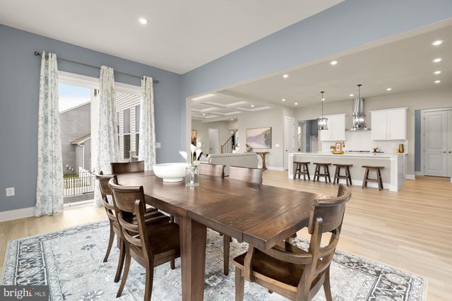 a large bedroom with a large bed and a window