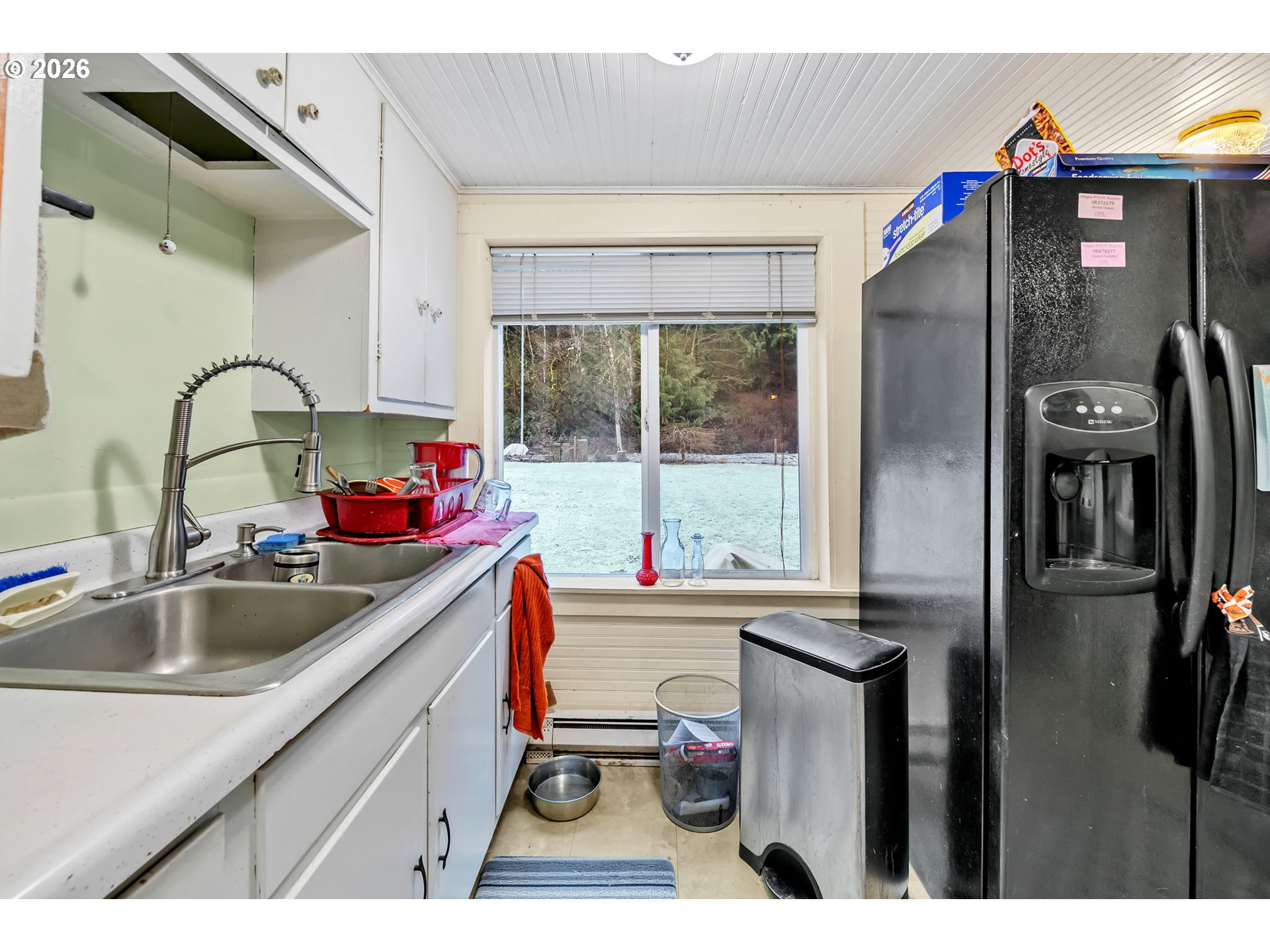 47054 Westfir-Oakridge Road Westfir, OR 97492 - Photo 12 of 28 a kitchen with a sink stove and refrigerator